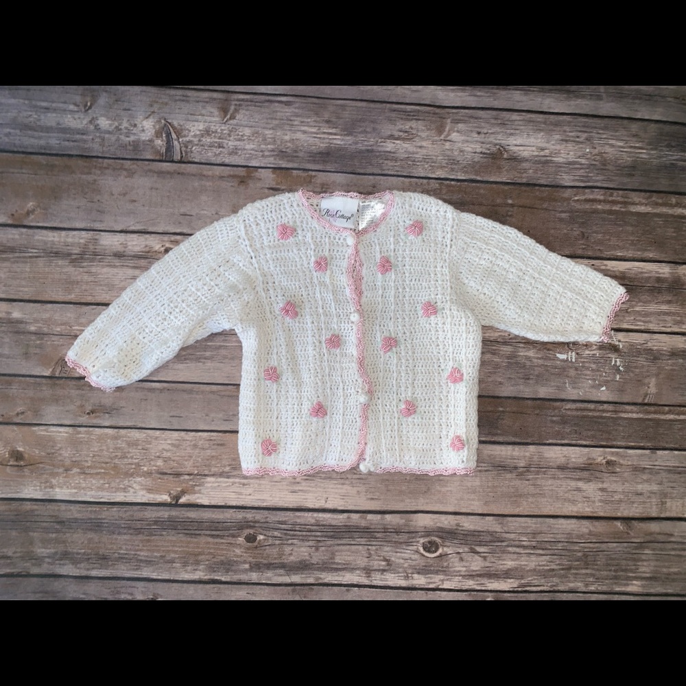 White and pink crochet sweater